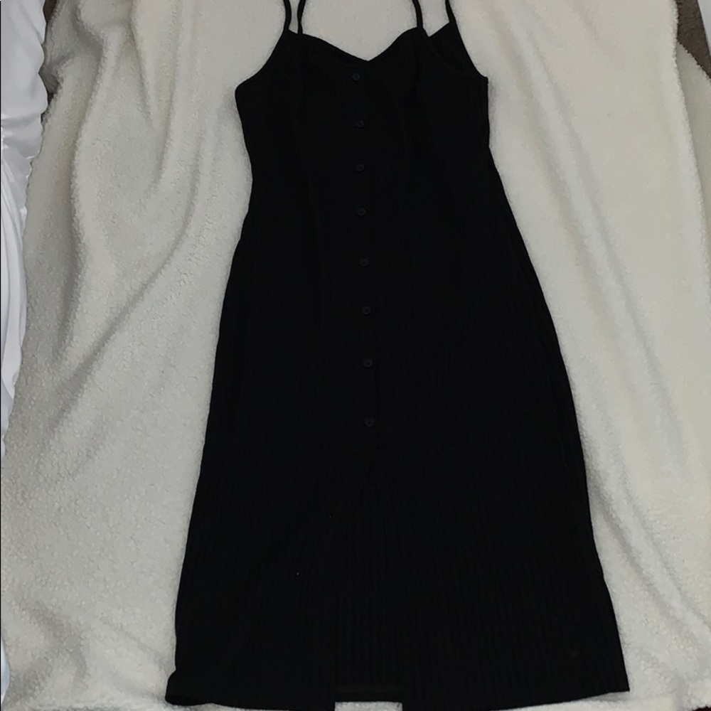 High front slit, faux button, black ribbed bodycon